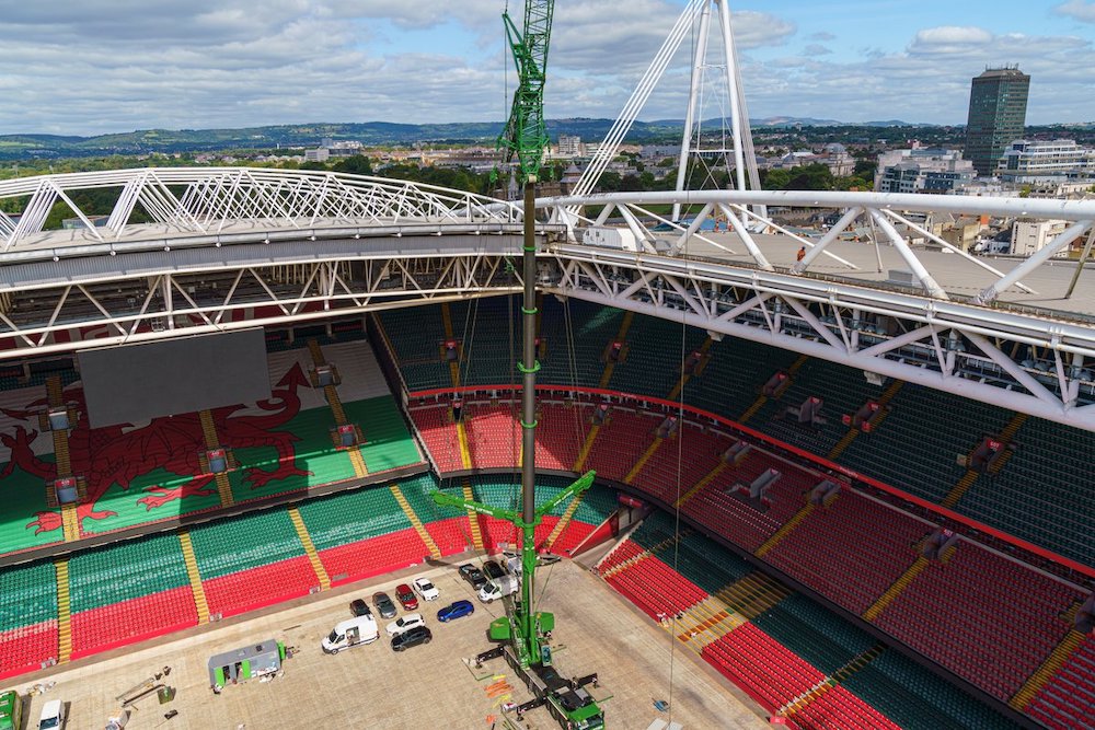 Alt tag for this image: alt="King Lifting performing crane installation inside Principality Stadium in Cardiff, with Welsh flag-colored seating